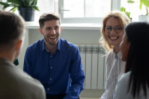 People participate in laughter therapy.