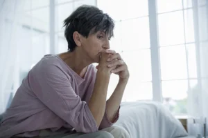 A woman struggles with depression in sobriety.