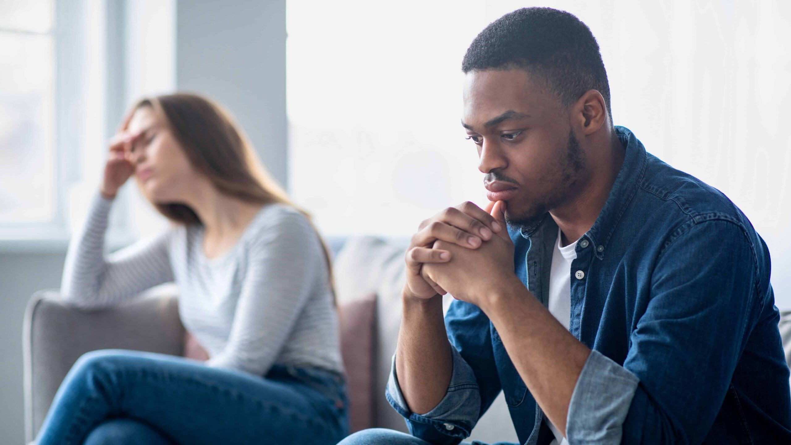 Man and woman discussing What Does Codependency Look Like in a Relationship.